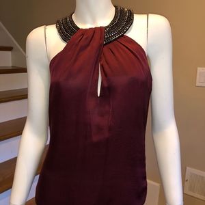 Bebe peep hole top with studded neckline